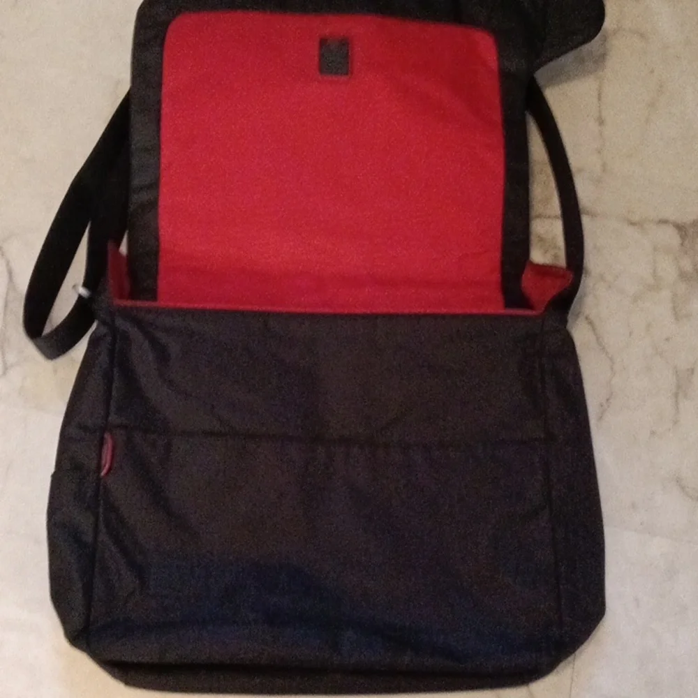 Tumi Black Laptop Messenger Bag.